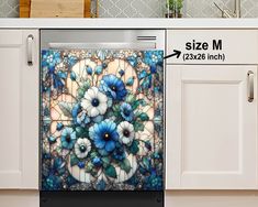 a dishwasher with blue and white flowers on it's glass cover in a kitchen