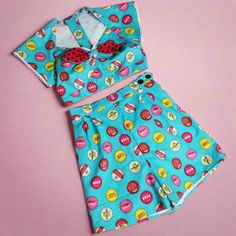 Here's a fun Soda Pop kitschy retro print fabric made as a two-piece pajama set from a 1940's vintage pattern. Approximate measurements 32" bust x 27" waist Playful Fitted Short Sleeve Sleepwear, Retro Summer Sleepwear For Pajama Party, Retro Short Sleeve Summer Sleepwear, Retro Short Sleeve Sleepwear For Summer, Retro Fitted Cotton Sets, Retro Cotton Sleepwear For Sleepover, Fitted Retro Summer Sleepwear, Vintage Fitted Short Sleeve Sets, Vintage Fitted Sleepwear For Sleepover