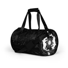 a black duffel bag with white designs on it