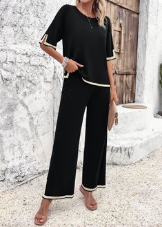 Get ready for ultimate comfort with the Delaney Loungewear Matching Set in black. Made from soft, high-quality fabric, this set includes a top and bottoms that are both stylish and cozy. Perfect for lounging around the house or running errands, this set is the perfect addition to any wardrobe. Size Guide: Model is 5’6” tall, and has a 33.2” bust, 26.4” waist, & 35.2” hips. She is wearing a S / US 4 / AU 8. This matching set is true to size. Material: 100% Viscose. Feature: Crew collar. Contrast trim. Short sleeves. Breathable Fabrication. No closures. Relaxed fit. (1 pcs top + 1 pcs pants, 2 pcs in total) Care Instructions: Machine wash / Cold hand wash Loungewear Matching, Trendy Boots, Trendy Accessories, Contrast Trim, Comfortable Fashion, Stylish Dresses, Matching Sets, Running Errands, Size Guide