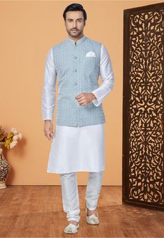 Art Dupion Silk Kurta in White This Chinese Collar Neck and Full Sleeve attire is Enhanced with Buttons, Pockets and Resham Work Available with an Art Dupion Silk Churidar in White and an Art Silk Nehru Jacket in Sky Blue Do note: Footwear shown in the image is for presentation purposes only. Half to one inch may vary in measurement. (Slight variation in actual color vs. image is possible) Engagement Mehndi, Light Blue Jacket, Powder Blue Color, Men's Kurta, Wedding Outfit Men, White Kurta, Chinese Collar, Turquoise Print, Nehru Jacket