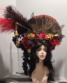 This Fan and flower headpiece  is unquestionably unique and one of a kind handmade by me.   It is inspired by my love of red and gold colors.  It is made from high quality silk flowers in red golds and black.   The fan is approximately 13 inches in height and sits slightly to the side to allow for the beautiful cascading flowers.  It has beautiful high quality crystals, dangle rhinestones in a clear silver tone pallet and hand dyed gold tasiles.  There's even a dragon head handpainted in gold and butterflies in black  All this beauty sits on my signature headband design for comfort.  The entire piece sits on top of your head.    Definetly get you noticed perfect for a wedding or cosplay or a dancer. Would make a beautiful theater headpiece or photographer prop or a Fairy.  This style to ma Red Crown Headpiece For Wedding, Red Tall Crown Costume Hat For Party, Red Festival Crown Headpiece, Red Crown Headpiece For Parties, Red Crown Headpieces For Party, Red Bohemian Headpiece For Party, Bohemian Red Headpiece For Party, Red Fantasy Headpiece For Costume Party, Fantasy Red Headpiece For Costume Party