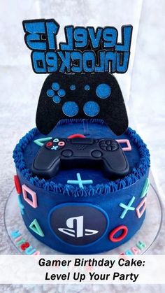 a birthday cake with a video game controller on top