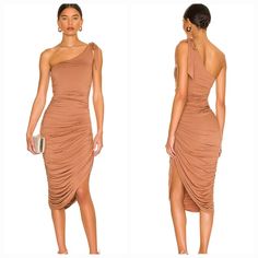 95% Rayon, 5% Elastane. Made In China. Hand Wash. Fully Lined Dress. Pull-On Styling With Shoulder Tie Detail. One-Shoulder Styling. Ruched Jersey Fabric. New Without Tags. Elegant One Shoulder Brown Midi Dress, Brown One-shoulder Midi Dress For Party, Brown Ruched Midi Dress For Night Out, Brown One-shoulder Midi Dress For Summer, Beige Ruched Midi Dress For Night Out, Brown Ruched Midi Dress For Date Night, Chic Brown Draped Dress, Fitted Brown One Shoulder Midi Dress, Chic Brown Ruched Dress