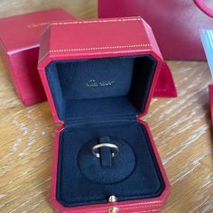 Authentic Cartier 1895 Wedding Band In Size 50 (5.25), Width 2.5 Mm, Yellow Gold. Comes With Dust Bag, Box, Bag, Certificate Authenticity, Receipt, Chocolate And Perfume Gifts Purchased Recently And Lightly Used, Still In Excellent Condition With Minor Light Scratches. Poshmark Will Authenticate This For Free Before Sending It To You. Cartier Wedding Band 1895, Cartier 1895, Wedding Band Yellow Gold, Jewelry Cartier, Cartier Jewelry, Perfume Gift, Box Bag, Womens Jewelry Rings, Cartier