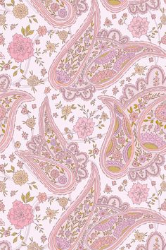 a pink paisley print fabric with flowers and leaves on the bottom half of its pattern