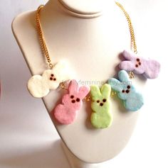 This necklace is so adorable, bold, realistic, and fun - perfect for Easter or the entire Spring season. I handmade these super cute marshmallow bunnies from polymer clay and added a realistic sugar-like texture. This necklace comes with a rainbow of the classic pastel colors: white, pink, yellow, blue, and purple. Five large bunny pendants are included. Each bunny is about 1.25" tall and comes laced together in the center of a gold or silver plated chain. Necklace is about 19" long and closes w Marshmallow Bunnies, Easter Necklace, Circus Animal Cookie, Jewelry Kawaii, Kawaii Necklace, Cute Marshmallows, Marshmallow Bunny, Candy Necklace, Pastel Candy