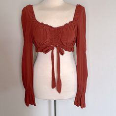 Cotton Candy La Brown/Orange Crop Top (Size M) New/Never Worn Orange Tops For Fall Day Out, Casual Cropped Peach Top, Trendy Burnt Orange Tops For Spring, Casual Burnt Orange Tops For Spring, Fitted Burnt Orange Top For Summer, Candy Brown, Orange Crop Top, Brown Orange, Cotton Candy