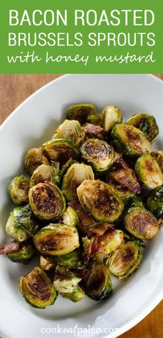 roasted brussel sprouts with honey mustard in a white bowl on a wooden table