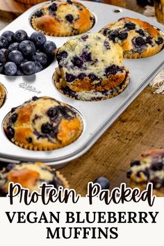 blueberry muffins in a muffin tin with the words protein packed vegan blueberry muffins