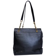 This Vintage Leather Triple Coco Shopping Bag Tote from the 1990’s is crafted in black leather. Featuring a triple interlocking CC logo embroidered on the front, a gold toned chain interlaced with leather connected to a leather strap with a top zipper closure. The front and back feature full length exterior slip pockets. The zipper opens to a large open interior with fabric lining and a zipper pocket. (Chanel bags with the serial number 4XXXXXX are manufactured from 1996 to 1997). COLOR: Black I Chanel Vintage, Black Stains, Shopping Tote Bag, Cc Logo, Vintage Chanel, Shopping Tote, Coco Chanel, Logo Embroidered, Vintage Leather