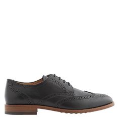 Elegantly styled Tod's derby oxfords for the modern man on the move. Featuring premium black leather uppers with perforated wingtip detailing and leather lining for classic comfort. Lace-up closure provides a tailored secure fit. Subtle rubber sole absorbs impact for all-day wear on concrete jungle streets or stylish weekend adventures. Industrial wingtip perforations add just the right dash of textured visual interest. Quality craftsmanship from Tod's Italian workshops ensures fashion flair and Classic Leather Shoes With Round Toe And Perforations, Classic Business Oxfords With Perforations, Classic Business Leather Shoes With Perforations, Classic Plain Toe Dress Shoes With Perforations, Derby Dress Shoes With Perforations And Plain Toe, Classic Formal Dress Shoes With Perforations, Classic Dress Shoes With Perforations For Work, Wingtip Dress Shoes With Perforations For Workwear, Classic Dress Shoes With Perforations For Derby