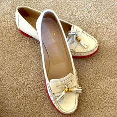 Nwot Size 9 White Soft Pebble Leather And Pink Rubber Sole Loafers/ Flats. Has Been Sitting In My Closet And Has Never Been Worn. There Is A Small Puncture (The Size Of A Dot) On The Exterior Of The Left Shoe That May Have Been Due To Being Open Box But Otherwise So Signs Of Damage. Item Will Not Come With A Box. Please Feel Free To Ask Any Questions! White Tassel Loafers With Leather Sole And Round Toe, White Round Toe Flats For Office, White Loafers With Removable Insole For Spring, White Moccasins With Textured Sole And Almond Toe, White Moccasins With Textured Sole, White Almond Toe Moccasins With Textured Sole, White Round Toe Casual Tassel Loafers, White Leather Tassel Loafers For Spring, White Casual Tassel Loafers With Round Toe