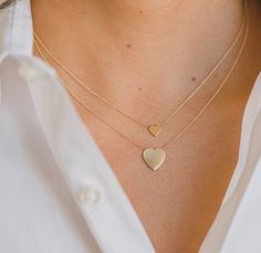 Classic and uber chic 14k gold heart on a dainty cable link chain necklace. Effortlessly chic, a timeless necklace that also makes the perfect gift! Made in L.A. *Size of Heart: Approx. 6mm(W) by 6mm(H) *Total Weight: Approx. 1 gram *Ships in 5-7 business days Comes gift ready in a custom Zoe Lev jewelry box Minimalist 14k Gold Double Heart Necklace, Minimalist Heart Necklace With Cable Chain, Everyday Yellow Gold Double Heart Charm Necklaces, Elegant Open Heart Charm Necklace With Heart Detail, Elegant Double Heart Charm Necklace With Delicate Chain, Elegant Open Heart Charm Necklace With Delicate Chain, Elegant Open Heart Charm Necklace, Dainty Yellow Gold Jewelry With Heart Detail, Elegant 14k Gold Open Heart Charm Necklace