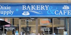 a bakery and cafe with people walking by