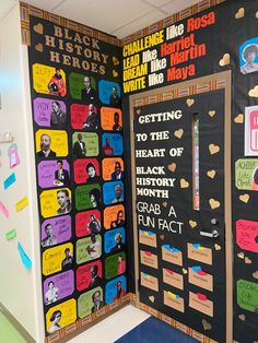 a bulletin board with writing on it in a classroom setting that is decorated with posters and magnets