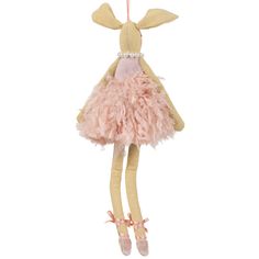 a stuffed animal in a pink dress hanging from a string