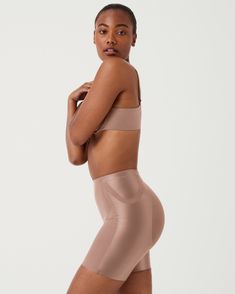 Get an instant butt lift in this shaping short designed specifically to naturally enhance and lift your behind. | Spanx Women's SPANXshape Booty-Lifting Mid-Thigh Shorts Bridal Shapewear, Mid Thigh Shorts, Designer Shorts, Beauty Secrets, Say Goodbye, Shapewear, Briefs, Athleisure, Fashion Illustration