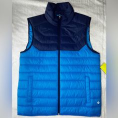 Nwtxersion - Puffer Vest - Medium Brand New With Tags. Puffer Vest With Pockets. Exterior Is Super Soft. Two Tone Dark Blue And Light Blue P2p- Approx 21.5”Inches Length -Approx 27.5” Inches Retains Heat Shell: 100% Nylon Lining 100% Polyester Filling: 100% Polyester Activewear Jogging Cold Training Exercise Snow Retains Heat Cozy Soft Vest Puffer Vest Please Look At The Pictures And Description Of Each Item. If Any Flaws It Will Be Listed/Shown There. Add Item Or Items To Your Bundle & I’ll Sen Blue Spring Outerwear For Workout, Spring Workout Blue Outerwear, Blue Spring Workout Outerwear, Blue Stretch Athleisure Outerwear, Blue Winter Sportswear Activewear, Blue Winter Activewear With Pockets, Winter Blue Activewear With Pockets, Blue Winter Activewear For Gym, Functional Blue Outerwear For Workout