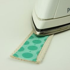 a close up of a piece of cloth next to a computer keyboard