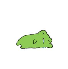 a green cartoon character laying down on the ground