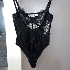 Forever 21 Brand Tic Toe Size Small Black Sheer Lace And Mesh Bodysuit With Adjustable Straps! Never Worn, New With Tags! Forever 21 Sleeveless Bodysuit For Night Out, Forever 21 Party Bodysuit With Lined Body, Black Flirty Bodysuit For Date Night, Red Lace Bodysuit, Yellow Bodysuit, Tank Top Bodysuit, Green Bodysuit, Ribbed Knit Bodysuit, Casual Bodysuit