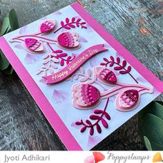 a close up of a greeting card with flowers and leaves on the front, featuring happy valentine's day