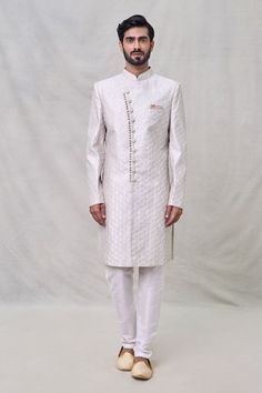 Gray sherwani with all over geometric, sequin embroidery. Paired with off white aligadhi pant. - Aza Fashions Designer Ceremonial Kurta With Mirror Work, Formal White Kurta With Mirror Work, Designer Straight Kurta For Reception, Designer Cutdana Kurta For Reception, Designer Sherwani With Mirror Work And Straight Kurta, Designer Ceremonial Sherwani With Mirror Work, Designer Traditional Wear With Mirror Work, Designer Kurta With Dupatta For Diwali, Designer Kurta With Dupatta For Eid