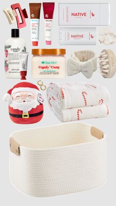 the contents of a christmas gift bag are arranged on top of each other, including toiletries and bath products