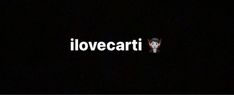 the word i lovecarti is lit up in the dark