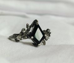 Vintage Black onyx Ring kite Sterling Silver Gemstones Ring, gifts for women, promise wedding ring gemstone  Handmade Gift For Her, Ring stone size   7x12mm kite Stone Color = Black  Ring Size :- All US Sizes Available Metal Purity :- 925 Sterling Silver  Our Goal is 100% Customer Satisfaction   Moss Agate Collection  https://www.etsy.com/shop/SilverOceanPoint?ref=seller-platform-mcnav§ion_id=39011648 Tourmaline & Ruby Collection  https://www.etsy.com/shop/SilverOceanPoint?ref=seller-platform-mcnav§ion_id=40796420  Turquoise Collection  https://www.etsy.com/shop/SilverOceanPoint?ref=seller-platform-mcnav§ion_id=40407562 Aquamarine & Emerald Collection  https://www.etsy.com/shop/SilverOceanPoint?ref=seller-platform-mcnav§ion_id=40789048 Dainty Ring, Crystal Raw Stone Ring, Raw Stone Ring, H Black Rings With Accent Stones For Gift, Black Diamond-shaped Jewelry For Gift, Black Crystal Gemstone Ring For Gift, Black Crystal Ring With Gemstone For Gift, Diamond-shaped Gemstone Ring Gift, Black Marquise Cut Jewelry For Gift, Her Ring, Raw Stone Ring, Zierlicher Ring