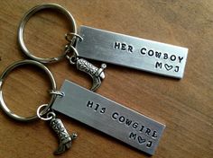 "Please Leave initials in notes when checking out. Unique couple gift !  Great for boyfriends. Girlfriends. Husbands. Wives. Western Country lovers! Stamped metal tag with wording \"His Cowgirl \" and \"Her Cowboy\", and initials.  Cann also add date if you like.   18 gauge jump ring attached to 1\" split ring. Tag measures 1.75\"\" X .50\"  and included boot Charms . All stamping is done by hand by me - each being a unique piece.   Each letter is stamped individually. Depth of imprint and exactness will vary by piece adding to the charm and uniqueness of the gift.  Key chain are shipped in organza bags Other variations: His Cowboy His Cowboy  Her Cowgirl Her Cowgirl   Sale is for 2 Keychain." Country Boyfriend Gifts, Cute Country Couples, Anniversary Keychain, Unique Gifts For Couples, Cowgirl Accessories, Country Couples, Couple Stuff, Metal Stamped Jewelry, Bf Gifts