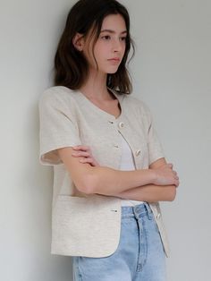 This is a minimal and feminine jacket by ourcomos that is made out of high quality and sturdy material. With distinctive mood of the design and comfortable wear, you can use it for your daily lifestyle.- Soft touch of linen and light cotton lining- Gold buttons on oatmeal fabric- Side pockets detail- Modern and minimal mood Beige Linen Casual Cardigan, Casual Beige Linen Cardigan, Beige Relaxed Fit Linen Cardigan, Beige Linen Cardigan With Relaxed Fit, Casual Cream Linen Outerwear, Chic Linen Outerwear For Everyday, Chic Linen Everyday Outerwear, Neutral Linen Outerwear For Everyday, Everyday Neutral Linen Outerwear