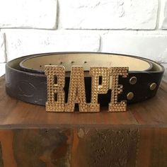 (eBay) Find many great new & used options and get the best deals for BAPE Gold Swarovski BAPE camo embossed leather belt A Bathing Ape Size XL at the best online prices at eBay! Free shipping for many products! Unique Belts, Bape Camo, Cool Belt Buckles, Y2k Jewelry, Jewelry Chest, Designer Pieces, Style 2023, Designer Belts, Year 2000