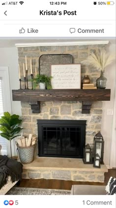 the fireplace is decorated with candles, plants and other things on it's mantle