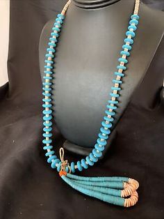 (eBay) • This beautiful Treasure Necklace has 1 Strands Spiny Oyster in Jacla, Turquoise and Many beads artistically strung with Shell and String. • Artisan Alfredo Aguilar ( Santo Domingo). • This Necklace goes well for casual dressed students or office goers. Luxury Collectible Kingman Turquoise Necklace, Luxury Untreated Turquoise Necklace In Sterling Silver, Handmade Blue Turquoise Necklace Collectible, Handmade Blue Turquoise Collectible Necklace, Handmade Blue Turquoise Necklace For Collectors, Treasure Necklace, Spiny Oyster Turquoise, Heishi Necklace, Native American Turquoise