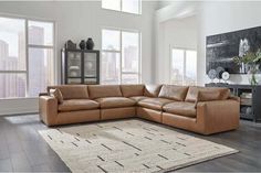 a living room with a large sectional couch