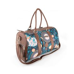 The Socorro Weekender Duffle Bag will make you plan a getaway, because you'll want to go somewhere -- anywhere -- with this sleek and versatile bag in hand. Our premier lightweight and eye-catching duffle features the best-selling Socorro print. Complete with two outside pockets for quick access to necessities, and two hidden interior pockets for valuables, this duffle is roomy enough for all of your essentials. The Socorro design with its buttery brown vegan leather and the serene desert landsc Duffle Bag With Removable Pouch For Overnight Trips, Duffle Shoulder Bag With Removable Pouch For Overnight Trips, Duffle Shoulder Bag With Zipper Pocket For Trips, Shoulder Duffle Bag With Zipper Pocket For Trip, Travel Duffle Bag With Removable Pouch, Travel Gym Bag With Zipper Pocket, Multicolor Travel Bag With Removable Pouch, Multicolor Duffle Bag With Luggage Sleeve For Travel, Trip Duffle Bag With Removable Pouch Tote