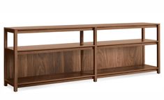 the sideboard is made from wood and has three shelves