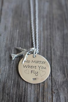 a necklace that says no matter where you fly