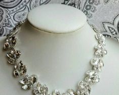 Items similar to Bridal Choker Vintage wedding Chocker 1920s Inspiration Hand made Silver Necklace Choker genuine Pearls and Swarovski Crystals rhinestone on Etsy Crystal Bridal Necklace With 17 Jewels For Wedding, Crystal Bridal Necklace With Rhinestones For Anniversary, Diamond Bling Necklace For Wedding, Diamond Necklace With Bling For Wedding, Wedding Diamond Necklace With Bling, Wedding Costume Jewelry Necklaces With Sparkling Stones, Art Deco Rhinestone Jewelry For Wedding, Art Deco Crystal Necklace For Wedding, Art Deco Crystal Jewelry For Anniversary