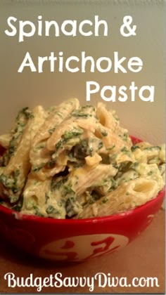 spinach and artichoke pasta in a red bowl with the words, spinach and artichoke pasta