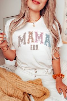 The In My Mama Era Shirt for moms is the perfect combination of style and comfort. Featuring the phrase "MAMA ERA", in retro font this shirt is sure to make a statement. Made with high-quality materials, this shirt is both soft and durable, making it perfect for everyday wear. Whether you're running errands or spending time with your family, this shirt is sure to keep you comfortable and looking great. ABOUT THE SHIRT Comfort Colors 1717 Unisex Jersey Short Sleeve 100% Ringspun Soft Cotton Fits Mama Shirts, Mama Sweatshirt, Retro Font, Shirt For Women, Mama Shirt, New Mom, Oversized Shirt, Gender Reveal, Jersey Shorts