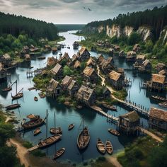 an aerial view of a village with boats in the water and houses on land next to it