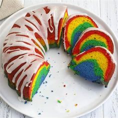 a rainbow bundt cake on a white plate