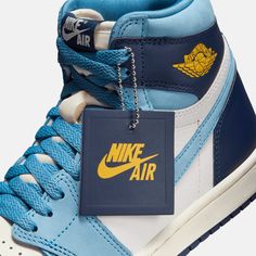 Style No FD2596-400 Color: University Blue/Midnight Navy/University Gold/Sail This "First in Flight" edition of the AJ1 honors the home of the high flyers. It celebrates the historic moments in flight, as well as the pioneers that first set our gaze on the skies. Earning its wings, the leather and nubuck design layers University Blue and Midnight Navy over a Sail upper with pops of University Gold, giving praise to the Tar Heel State that laid the foundation. Air Jordan 1 Retro High OG Women's S Flight Shoes, Air Jordans Women, Womens Air Jordans, Jordan Air, Jordans Women, Air Jordan 1 Retro High Og, Air Jordan 1 Retro High, Basketball Sneakers, University Blue