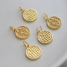 Material: Brass Description High quality 14K gold plated brass, color not easily tarnish Size: 13mm, thick 2.1 mm Quantity: 5 pcs. Color: 14K gold Material: 14K gold plated brass ❤ More pendants items here: ❤ https://www.etsy.com/hk-en/shop/basicDIYcraftstore?ref=simple-shop-header-name&listing_id=806990990&section_id=29121362 ❤ More other items here: ❤ https://www.etsy.com/shop/basicDIYcraftstore?ref=simple-shop-header-name&listing_id=823835581 Shipping Following is the place that o Gold Charm Necklace With Medallion, Gold Medallion Charm Necklace For Good Luck, Gold Round Pendant Charms That Are Tarnish Resistant, Gold Tarnish-resistant Charm Necklace For Good Luck, Gold Tarnish-resistant Round Pendant Charm, Gold Round Charm Necklace, Tarnish Resistant, Gold Round Pendant Charms For Good Luck, Gold Round Charm Necklace Tarnish Resistant, Gold Plated Pendant Charms