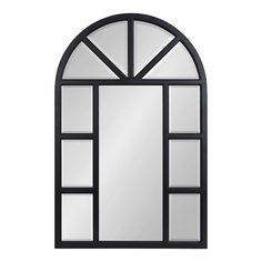 an arched window with black frame and mirror on the wall, isolated against a white background