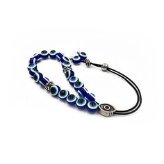 This is a listing of a Greek Komboloi - Worry Beads created from 21 Blue Acrylic Evil Eye Beads, 2 silver tone metal beads and silver tone metal master bead. Item can be made with cord color of your choice. Please choose the cord color you would like from the drop down menu. Features: Item Length: approx 26cm / 10 inches Beads Size: 10mm / 0.39 inch Beads Type & Color: Acrylic Blue Evil Eye Beads Metal Materials: Silver tone Metal Alloy ✔ Here you can browse more items in our shop: https://www.e Adjustable Blue Jewelry With Silver Beads, Adjustable Blue Hand-strung Rosary Bracelet, Adjustable Hand-strung Blue Rosary Bracelet, Silver Spiritual Evil Eye Bracelet With Round Beads, Adjustable Beaded Blue Rosary Bracelet, Handmade Adjustable Blue Rosary Bracelet, Adjustable Blue Beaded Rosary Bracelet, Adjustable Evil Eye Spiritual Beads, Silver Beaded Bracelets With Evil Eye