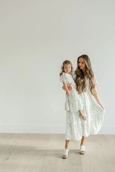 Mommy And Me Dress, Clogs Outfits, White Clogs, Light Green Dress, Beautiful Floral Dresses, Mommy And Me Dresses, Flowy Shorts, Green Midi Dress, Tier Skirt